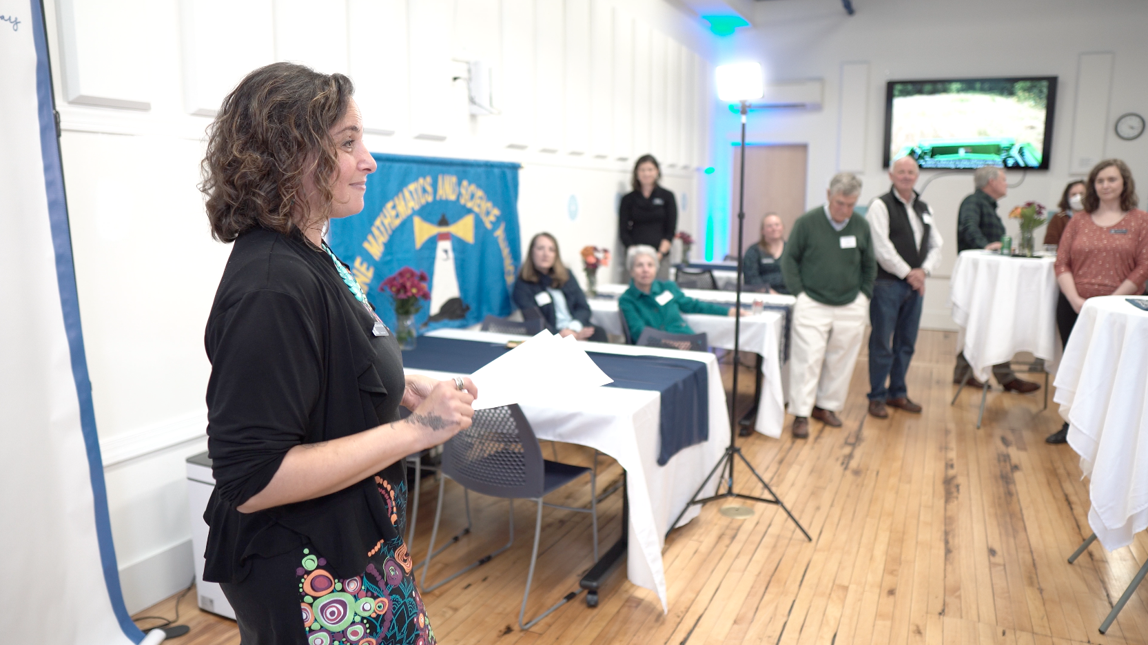 An image of Ruth Kermish Allen addressing the attendees of the 30th anniversary event.