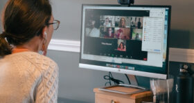 A photo of a facilitator working with afterschool educators in a virtual meeting space.