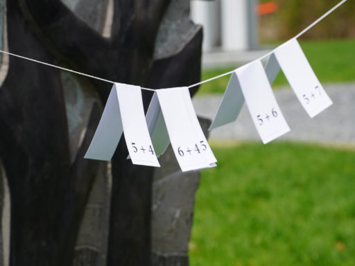 Math cards hanging on a line.
