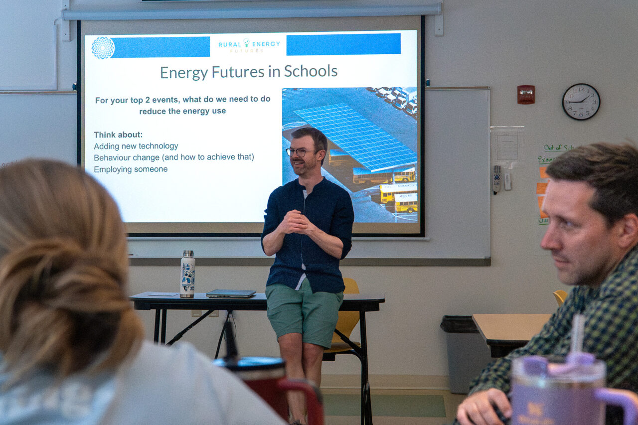 An MMSA staff person gives a presentation on energy futures in schools at a Rural Energy Futures project gathering.